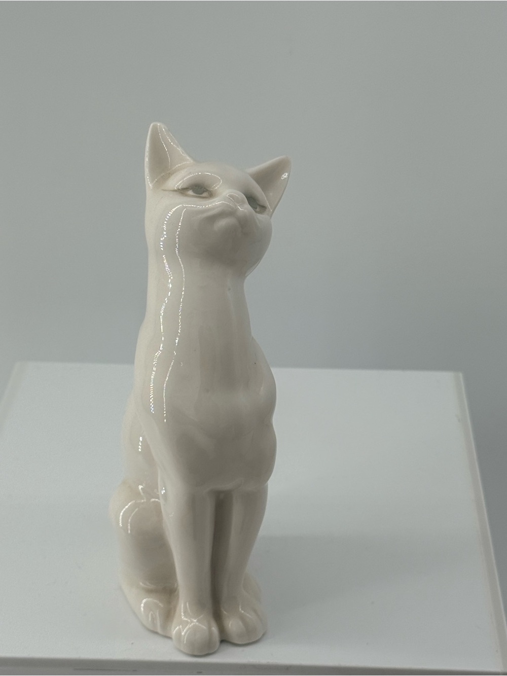 Glossy Cream Ceramic Cat Sculpture - Decorative Home Accent